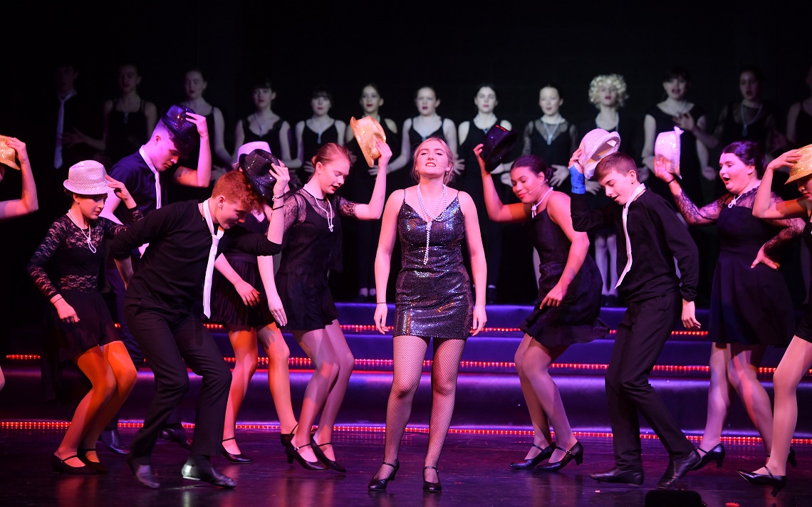 Pupils dazzle during a production of Chicago