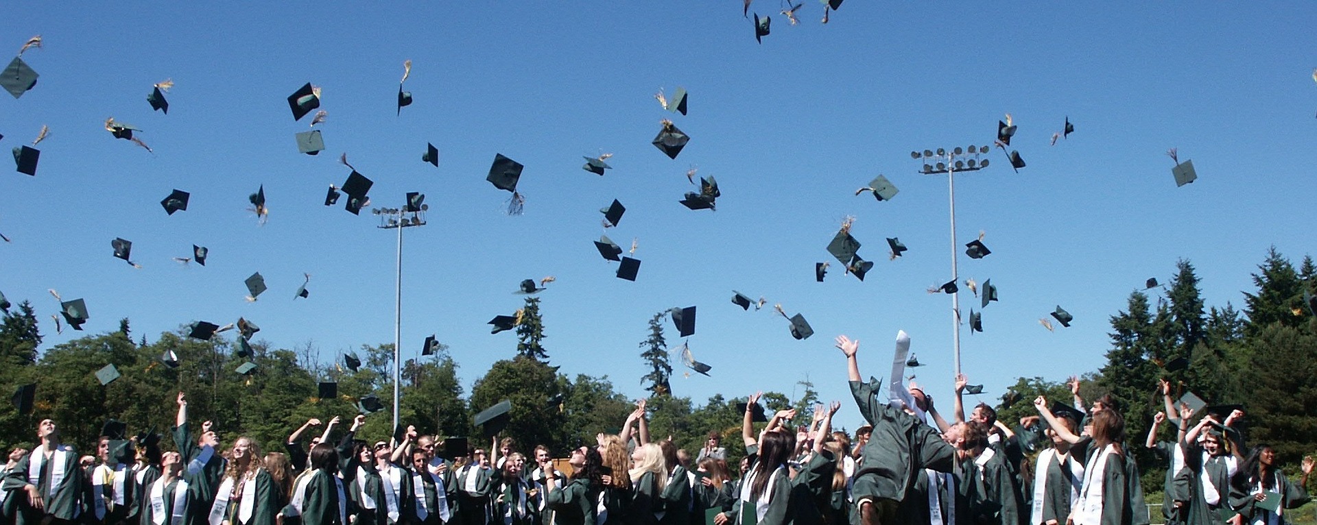 Mortarboards in the air