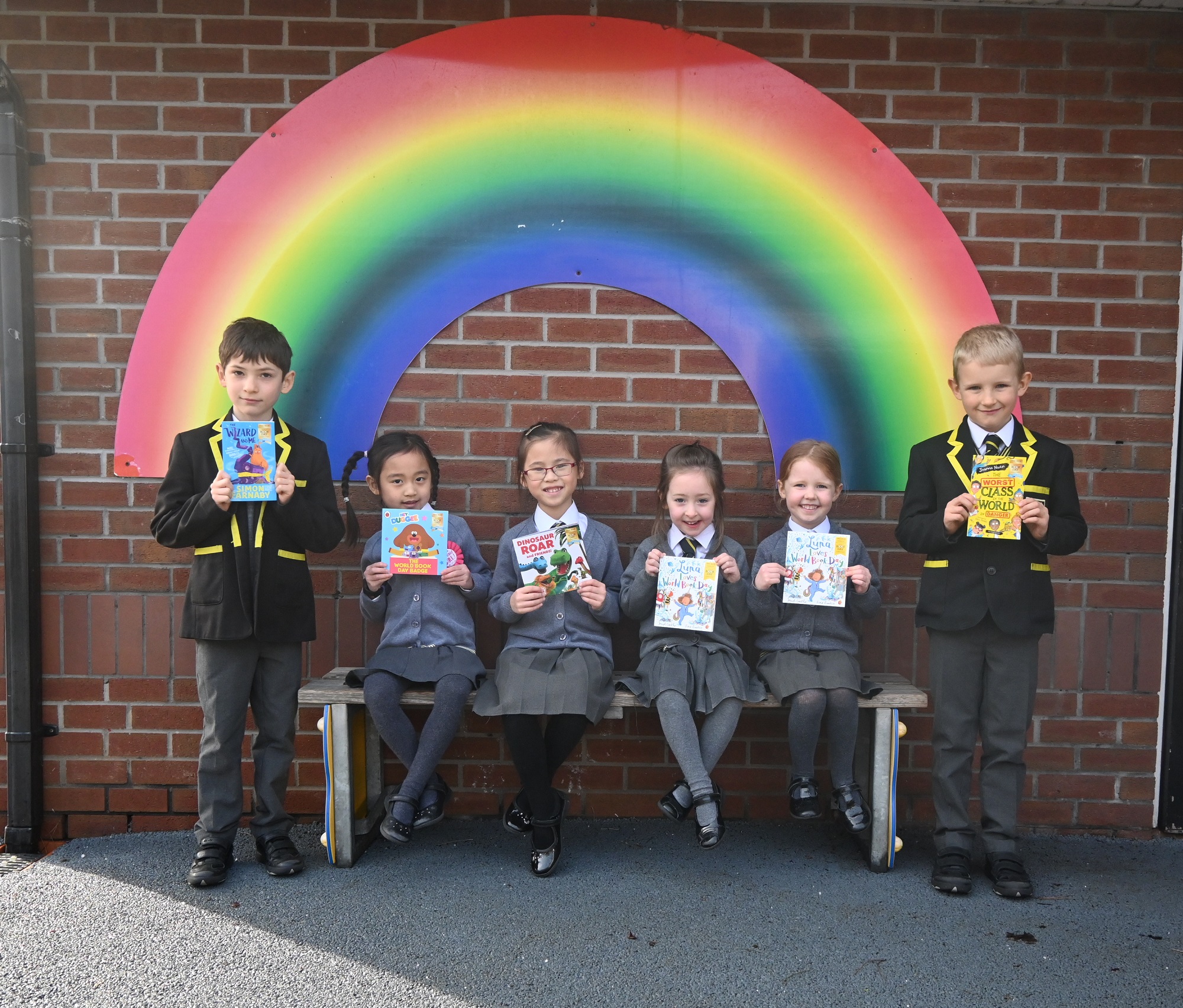 Infants with their World Book Day gifts