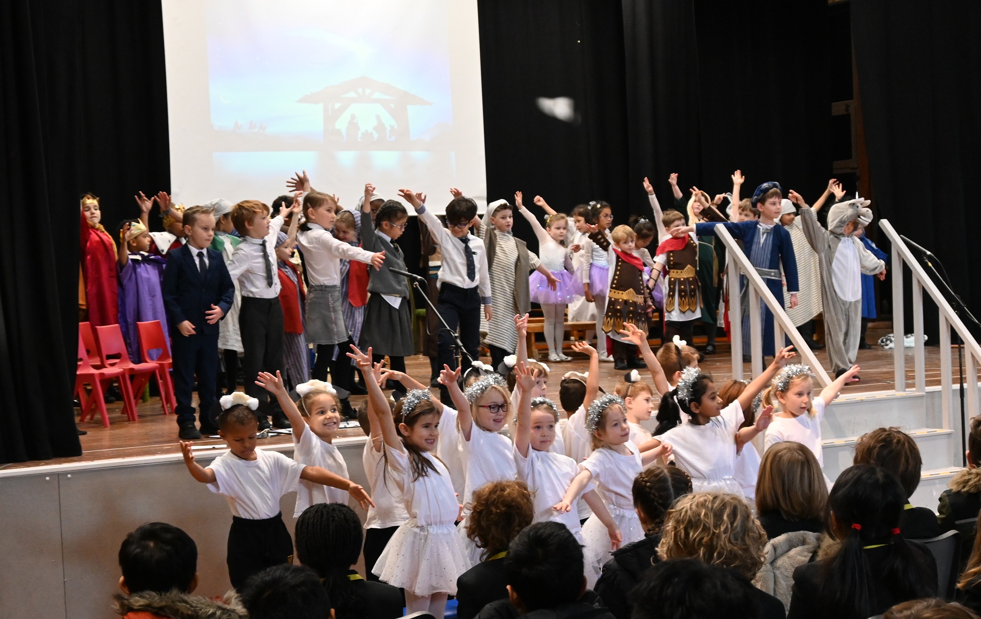 Pupils do the actions during the 2022 Key Stage One Nativity