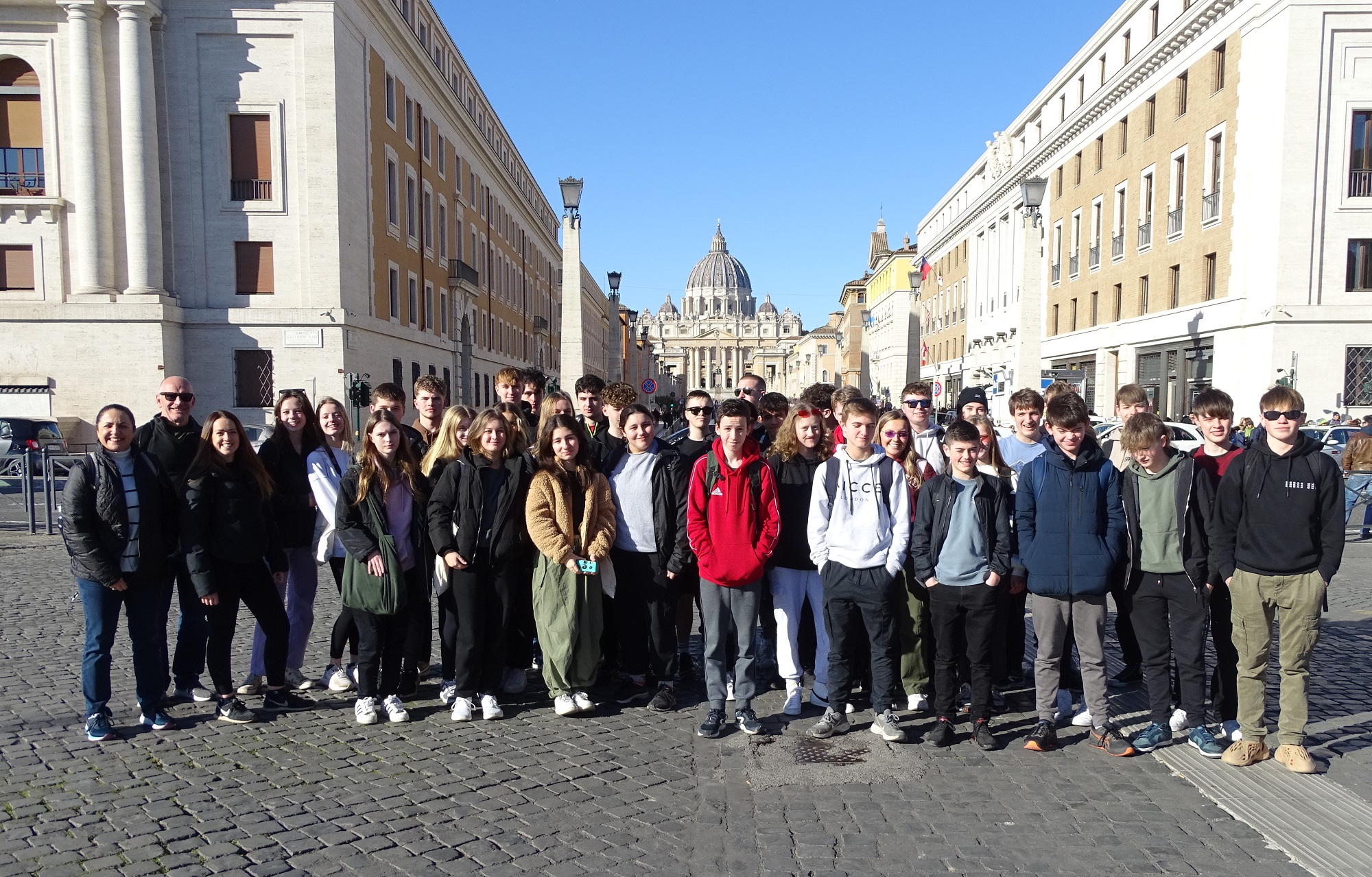 Pupils and staff pose for a photo during their Classics trip to Rome