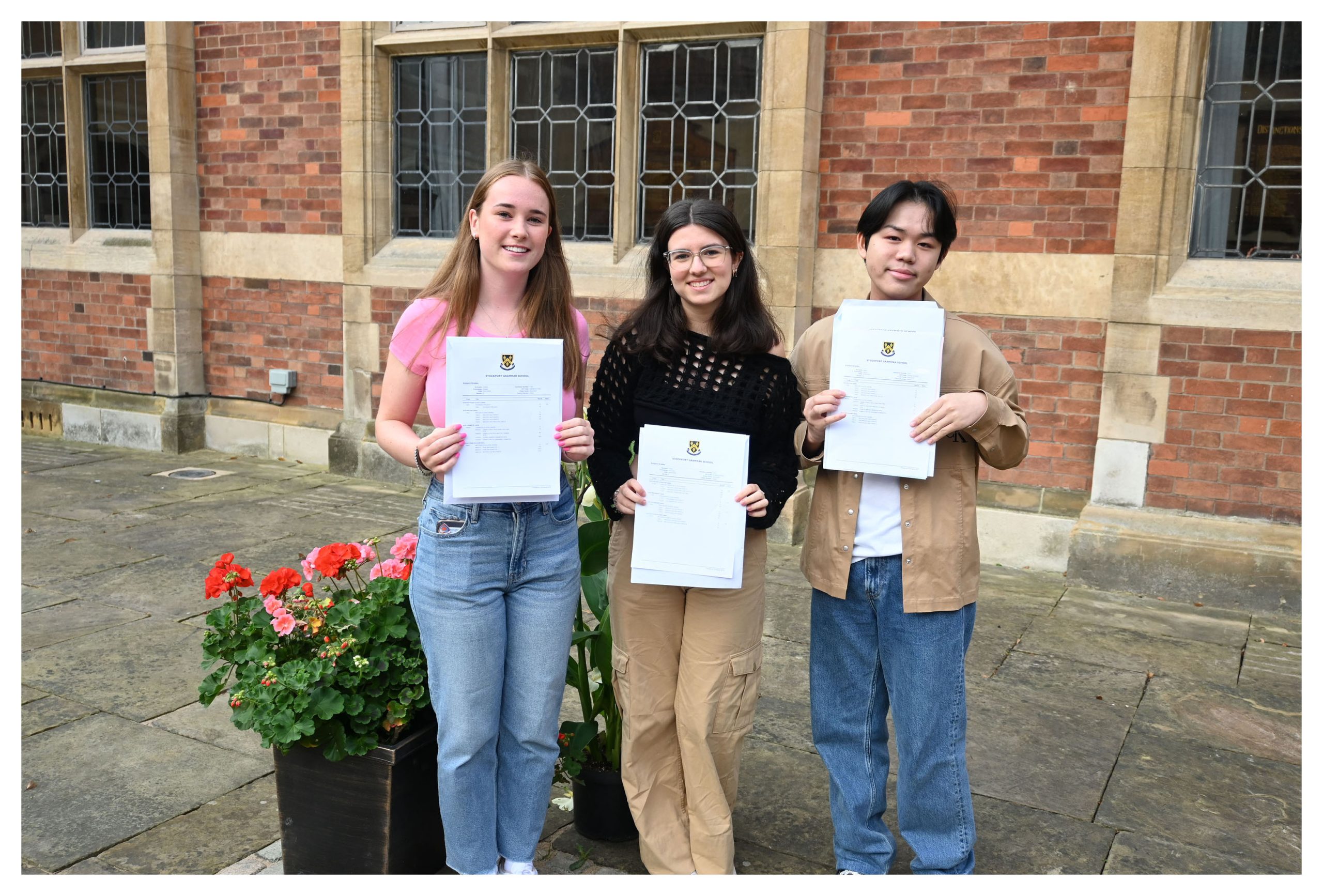 A-level students with their results