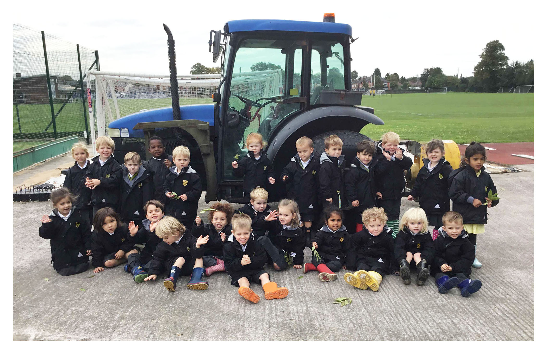 Nursery children go on a tractor hunt