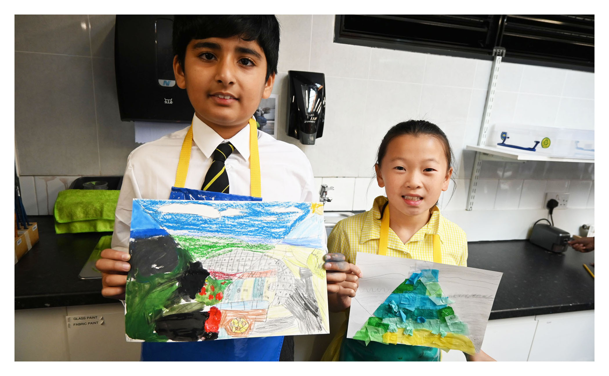 Junior School pupils with their completed artwork following a workshop