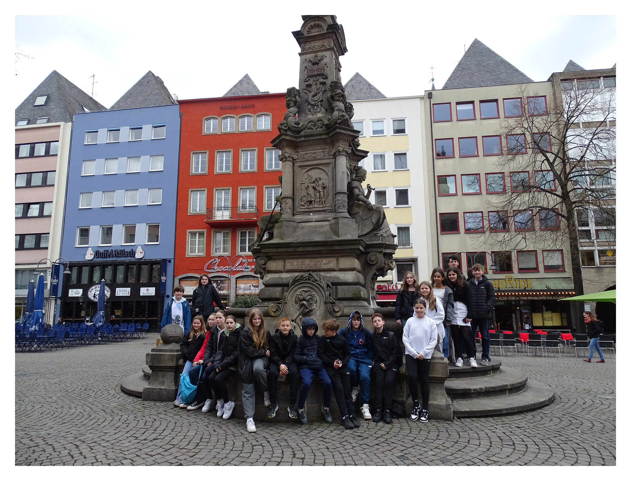 Second Year pupils pose for a photo at a water fountain during their trip to Germany